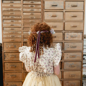 TIE DETAIL OF THE LAVENDER FLORAL CREAM TULLE TUTU
