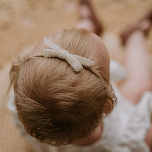 petite baby bow headband - cream velvet