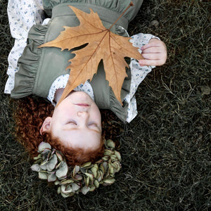 Green ruffle playsuit for little girls bu AUBRIE