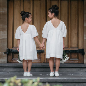 BACK VIEW OF VICTORIA FLOWER GIRL DRESSES IN SNOWFLAKE BRODERIE ANGLAISE