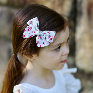 pinwheel bow hair clip - raspberry blossoms floral