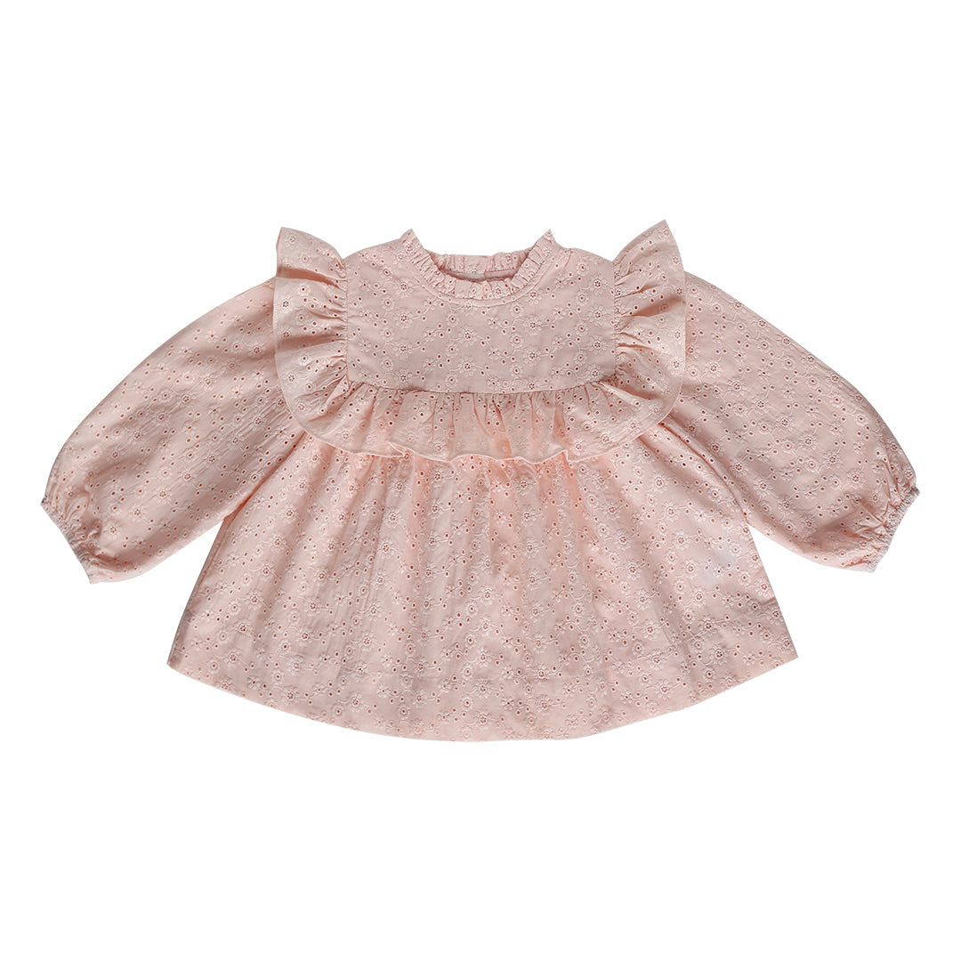 Side view of the Amelia Broderie Anglaise in blush pink