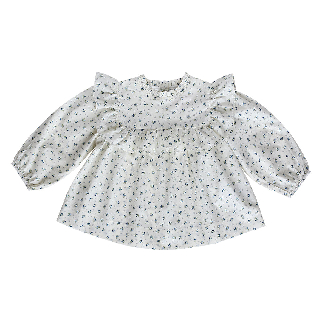 The Amelia blouse twinning with our matching Arabella baby romper in the same Bluebelle floral.