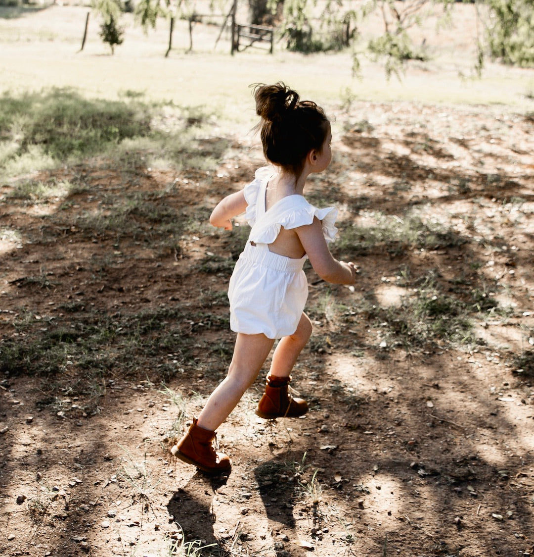 Crossover back Puck Playsuit in ivory twill by AUBRIE
