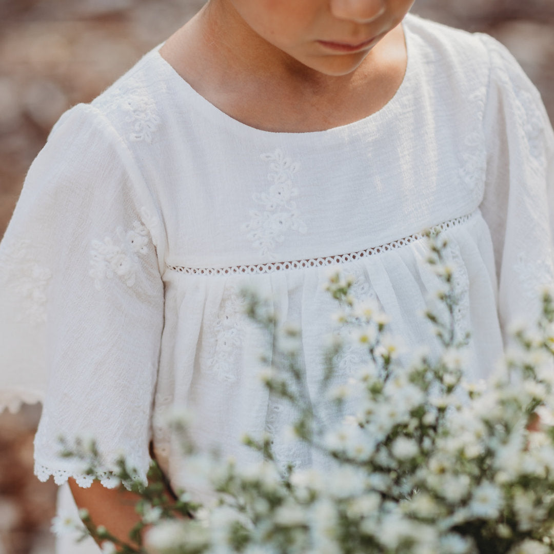 Lace insert yoke detail of Mariposa flower girl dress