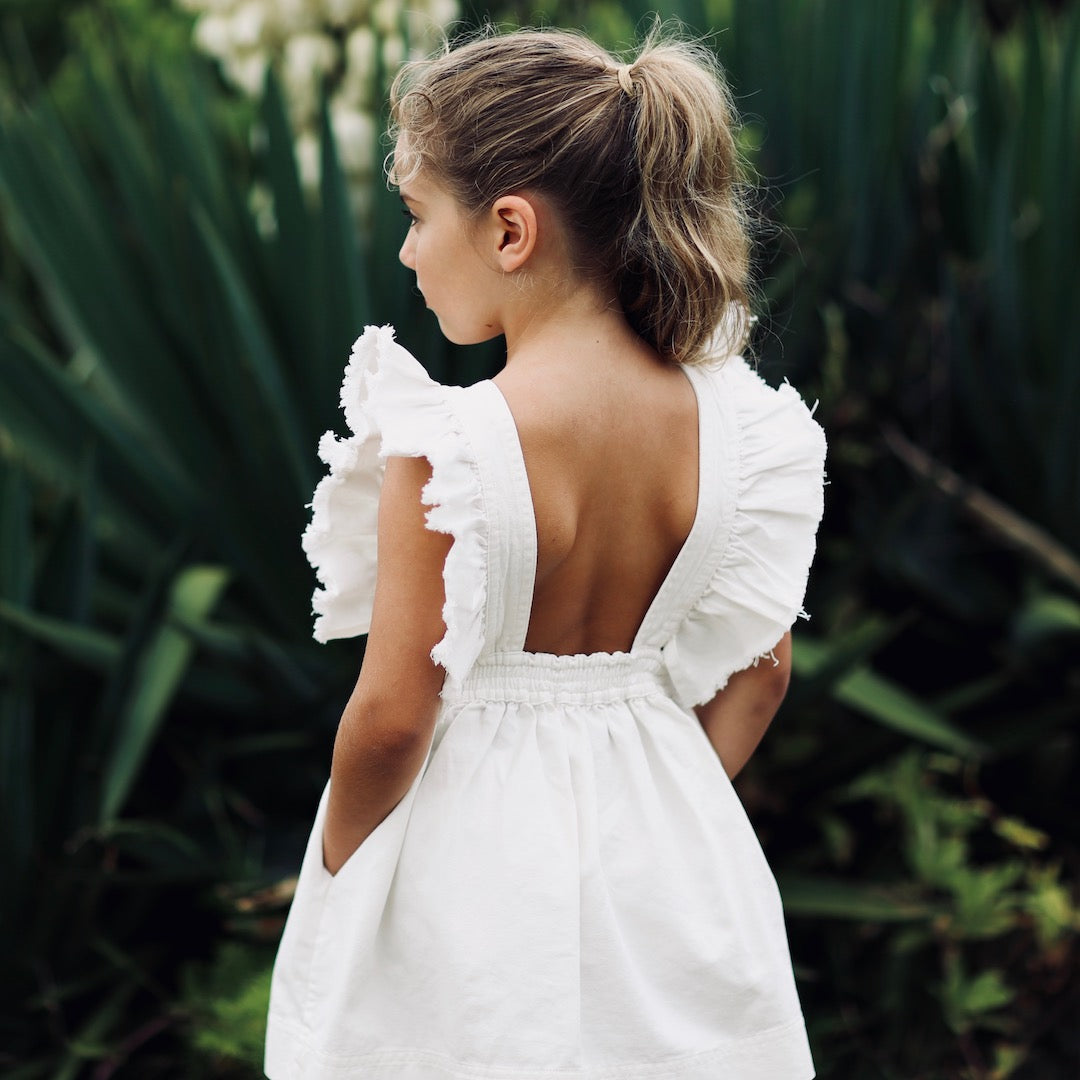 Mabel girl's pinafore dress in milk white denim