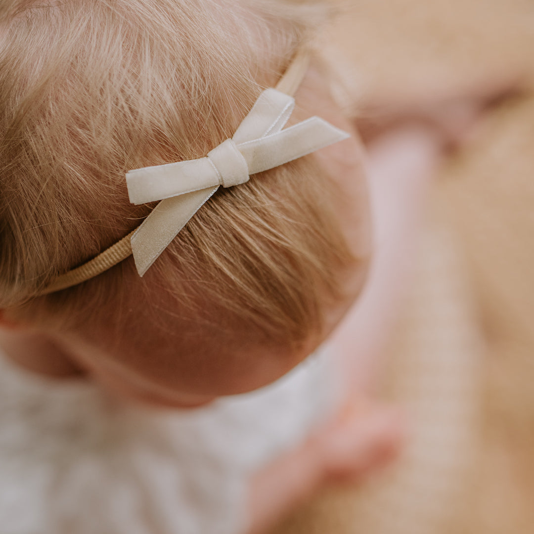 petite baby bow headband - cream velvet
