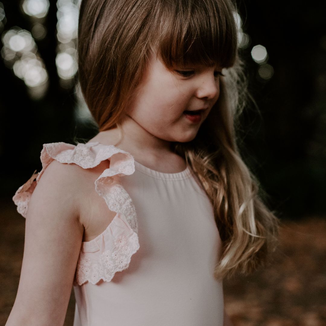 Embroidered cotton lace detail of Dixie bodysuit